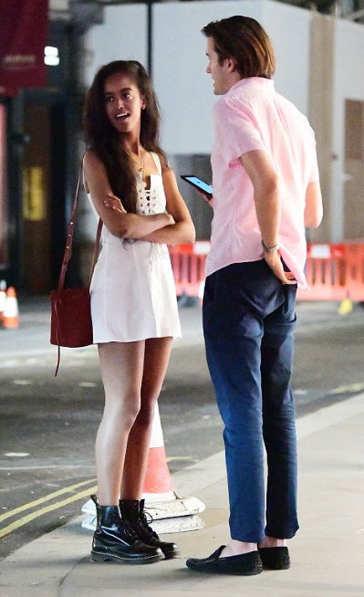 Malia Obama spotted in Mayfair London with her White boyfriend as he smokes a cigarette