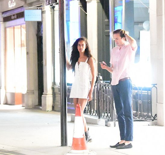 Malia Obama spotted in Mayfair London with her White boyfriend as he smokes a cigarette