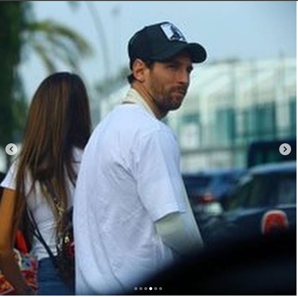  Injured Lionel Messi pictured wearing sling for the first time after breaking his arm (Photos)