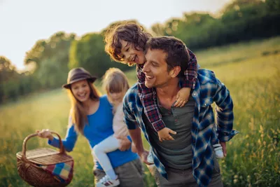Photo of a happy family going for picnic