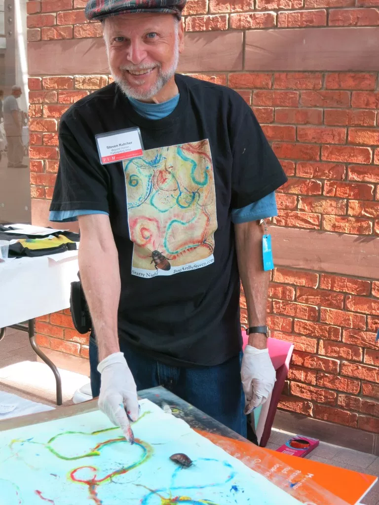 Image: Steven Kutcher painting outside of the Peabody Essex Museum 