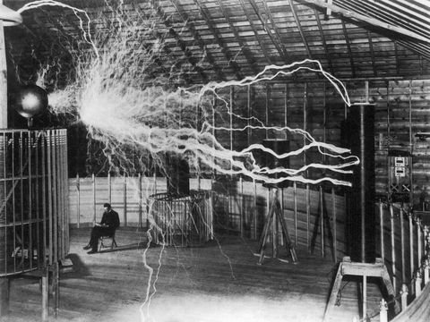 Bolts of electricity discharging in the lab of Nikola Tesla.