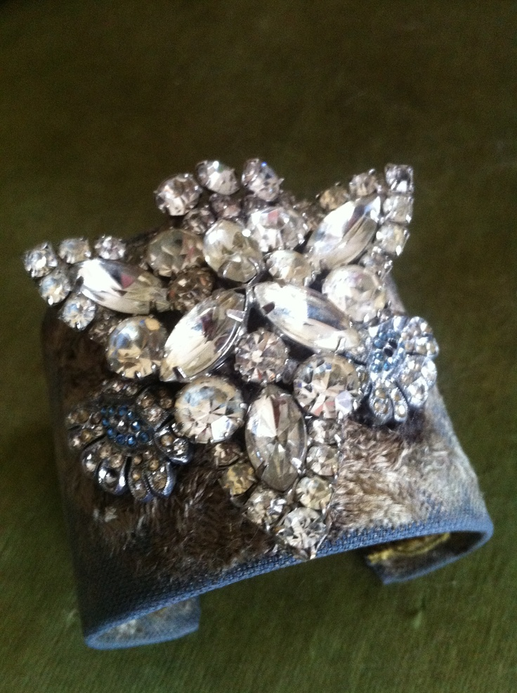 Vintage fabric cuff adorned with vintage rhinestone pieces. $95