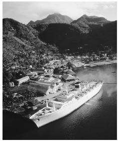 A cruise ship moored at Pago Pago. Visitors to American Samoa help boost the local economy.