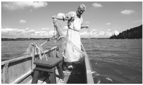 A fisherman in Attersee. While Austria is highly industrialized, traditional methods and customs are held in high esteem.