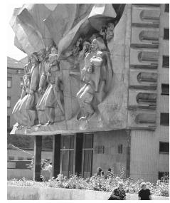 An imposing sculpture decorates the front of an apartment house in Minsk. Historical and domestic subjects were a common theme of early twentieth-century Belarusian art.