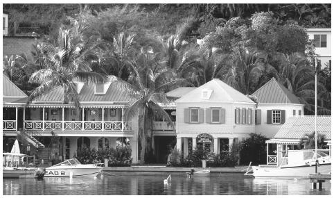 Colorful buildings along the waterfront in Tortola are indicative of Caribbean architecture.