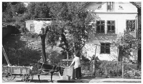 A Bulgarian man draws water from a roadside well near Belogradchick.