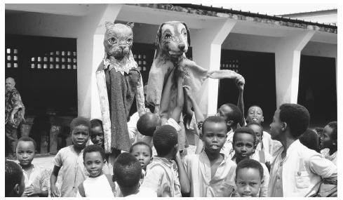 Students at a school watch a performance representing the Hutus and Tutsis groups. The Hutus and Tutsis have a longstanding history of ethnic differences, which has split not only Burundi, but extends into Rwanda and the Democratic Republic of Congo.