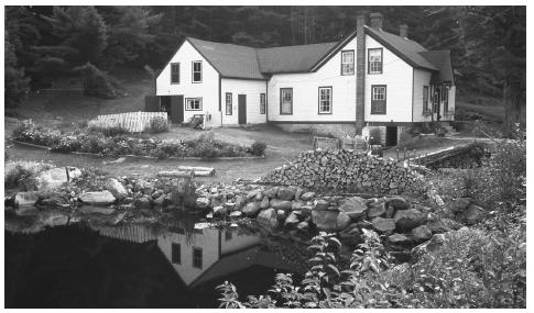 A house and pond in rural Nova Scotia. Most Canadians live in private homes.