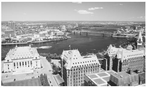 The neoclassical buildings of the Canadian Parliament and the modern architecture of Hull, the city across the river, are representative of the diversity found in Canada.