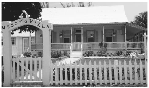 A cottage on Grand Cayman. Large porches and gabled roofs are not uncommon.