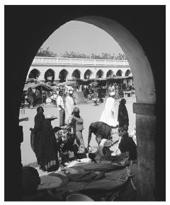 People buying flour at a market in the town of N'Djamena.