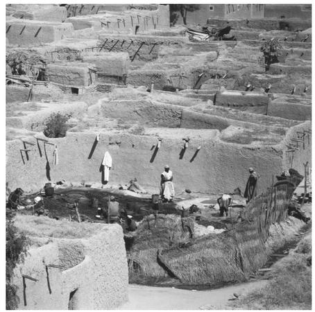 Blacksmiths' workshop in the town of Fort Lamy (now N'djamena). Blacksmithing is considered a 