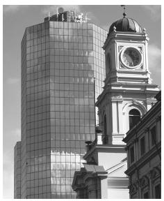 Downtown Santiago features a mix of modern and colonial buildings.