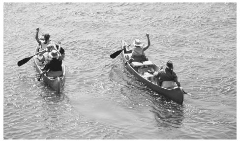 Canoeing on the Zambezi River. Rivers are a common mode of transportation in the Democratic Republic of the Congo.