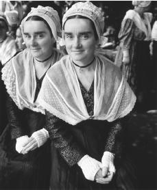 Breton girls in costumes for a festival. Each commune generally holds a festival during the year.