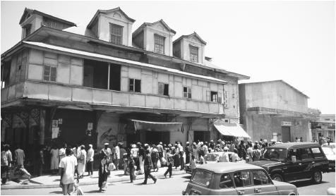 Shoppers and cars in downtown Banjul. The capital is Gambia's only urban center.