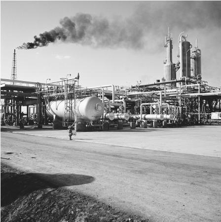 Pipelines and storage tanks at a gas liquification plant in Bandar Mah Shar.