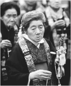 Women in costume at the Needle Festival in Tokyo.