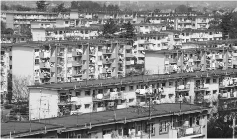 Rows of apartment houses in Osaka. Approximately 65 percent of Japan's population lives in cities.