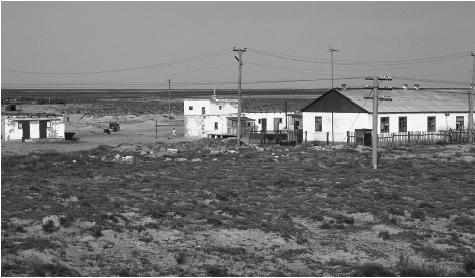 A farm on the steppe grasslands near Kul'Sary, Kazakhstan. Many rural Kazakhs acquire the food they eat from their own land.