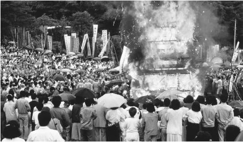 People attend the funeral and cremation of a Buddhist monk. North Korea. Though there are Buddhist monks and nuns in the country, North Koreans do not have much religious freedom.