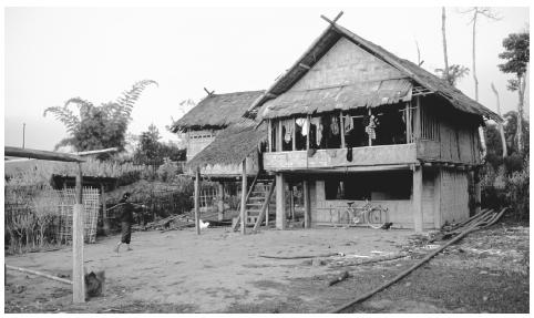 A house in the small northern town of Xiang Kok. Most Lao people live in rural villages clustered around a temple.