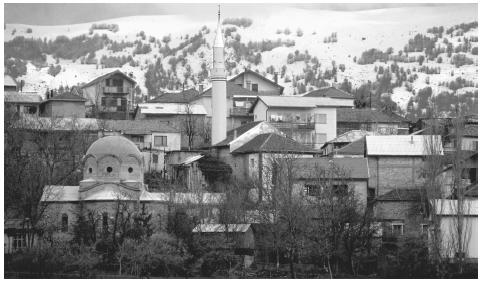 A minaret overlooks a Macedonian town. Thirty percent of Macedonia's population is Muslim.