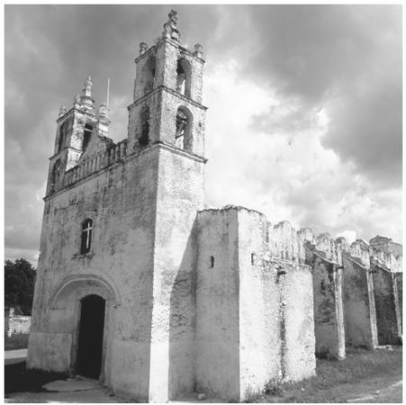 This colonial church with two bell towers was built with ancient Maya stones. Spanish and French architectural traditions influenced Mexican buildings.