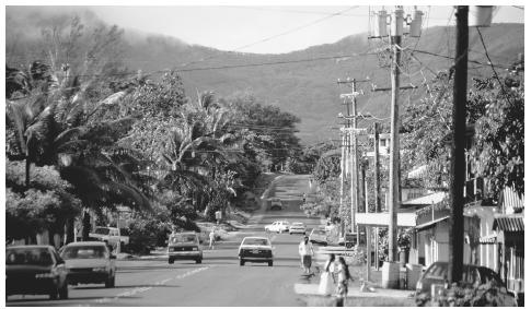 A paved road in the coastal village of Kolonia, Pohnpei. Pohnpei is the main island in Micronesia.