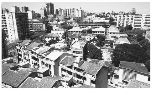 Aerial view of the capital city Maputo. It was constructed with wide streets, public gardens, and paved sidewalks inlaid with mosaics.