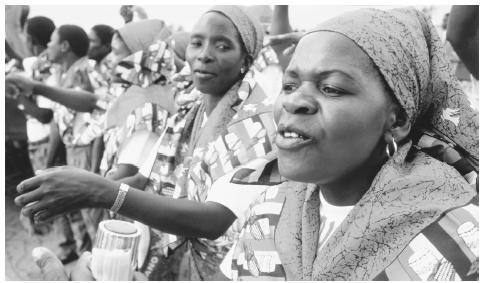 Supporters turn out at an election rally in Chokwe, Mozambique. Citizens enjoy universal suffrage.