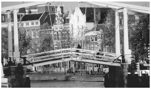 A drawbridge over a canal in Haarlem. Dutch cities are compact and densely populated.