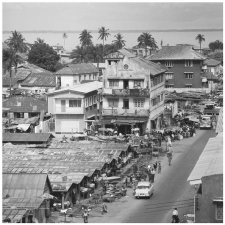 Homes and market near the Lagos Lagoon. Nigerian cities have grown to resemble western urban centers.