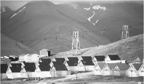 A collection of houses built for coal miners and painted colorful tones to reduce suicide rates in the long, dark winters of Spitsbergen.