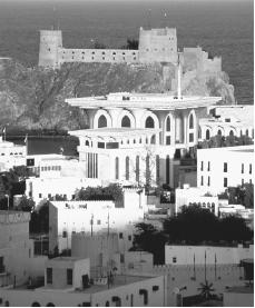 View of Muscat city buildings along the Gulf of Oman. Oman is a sultanate, with a sultan as the head of state and government.