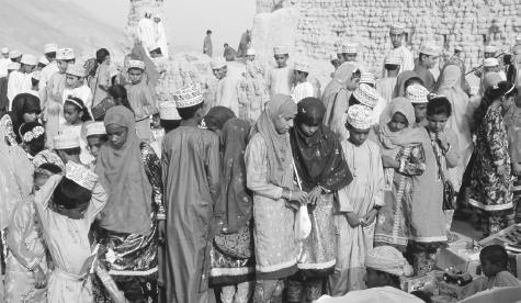 A crowded market in Fanja. The vast majority of the population outside of the capital area are engaged in subsistence agriculture, fishing, or animal husbandry.