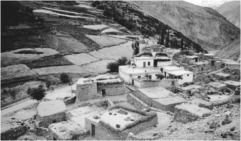 Houses in Baltit. Pakistan's landscape includes snowcapped mountains and valleys such as this, as well as sunny beaches.