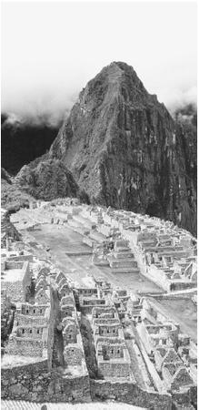 Remaining structures of the ruined city of Machu Picchu, built by the Incas in the Andes.