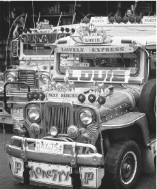 Painted Jeepneys on a city street.