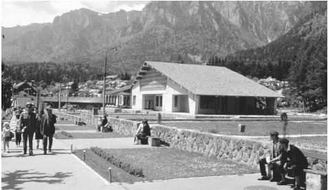 A Romanian town and the Transylvanian Alps. The highest peak in the country, Mount Moldoveanu, is located in these Alps.