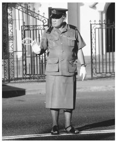 Upolu police officer in traditional dress.