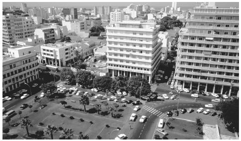 View of Dakar's Independence Square. Many rural lands are still owned by city dwellers.