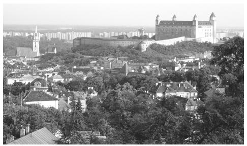 Bratislava Castle, a former palace, on a hilltop overlooking Slovakia's capital city, which is situated on the shores of the Danube River.