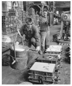 Foundry workers pouring molten metal into molds. While women comprise 45 percent of the workforce, they are largely confined to the welfare, public services, and hospitality fields.