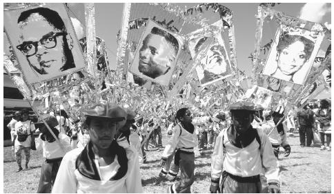 Children marching in the Junior Parade of the Bands in Queen's Park Savannah. Port of Spain, Trinidad and Tobago.