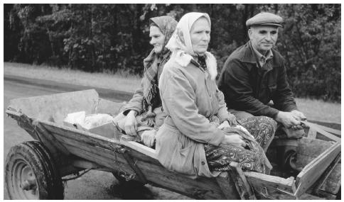 Farm workers travel in a village near Orane. Seventy percent of the land in the Ukraine is used for agriculture.