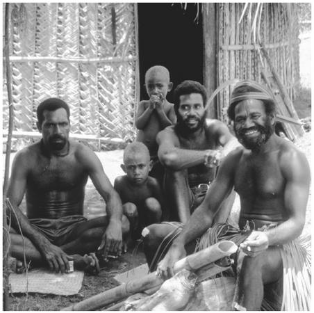 Villagers congregate in the protection of the shade on Ambrym Island. Households rely on extended kin groups.