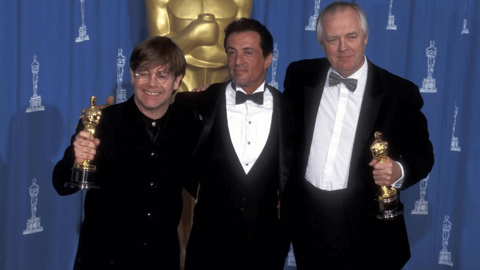 Elton John, Sylvester Stallone and Tim Rice 
